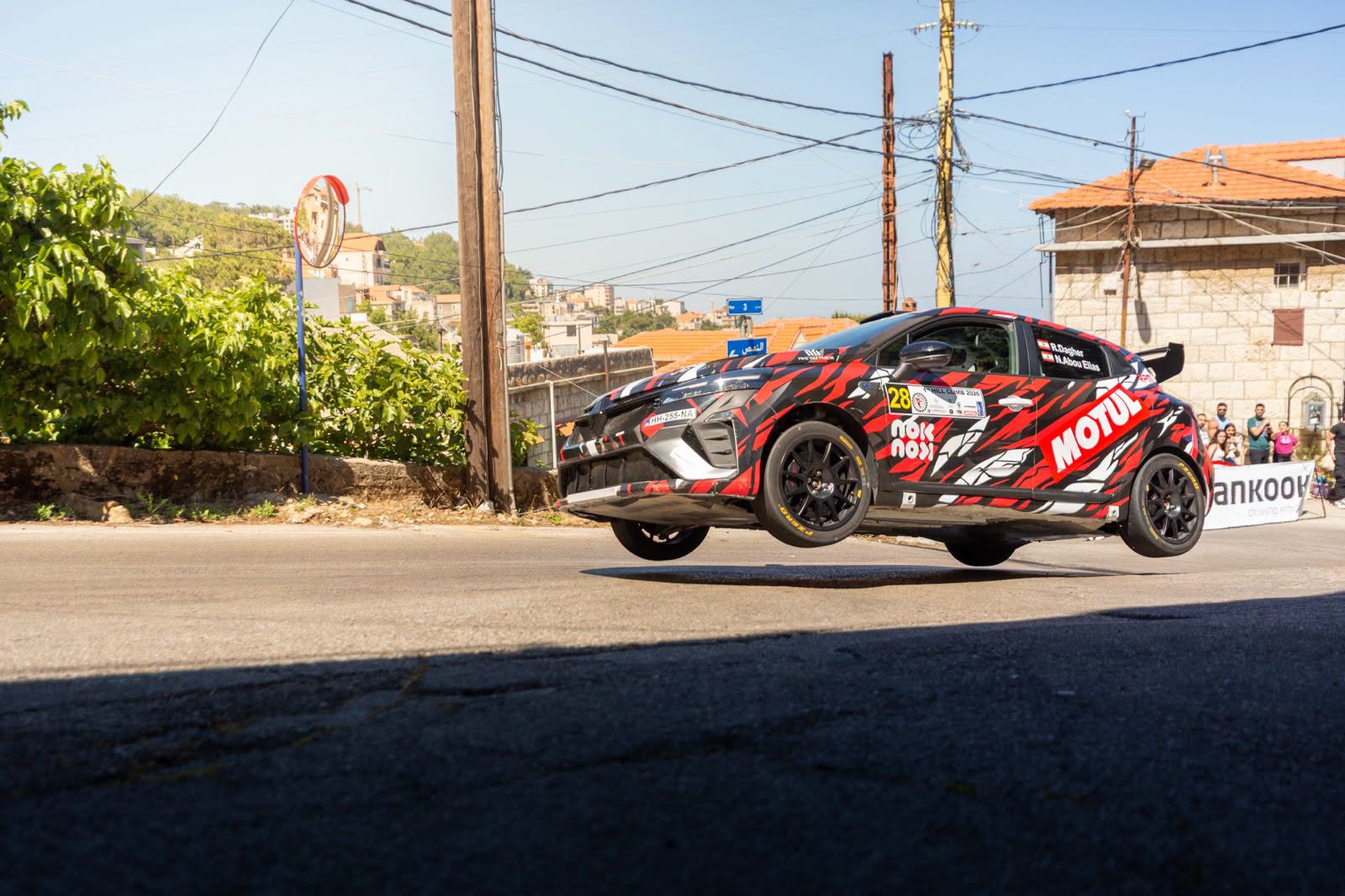 Rhea Dagher's rally car airborne during competition